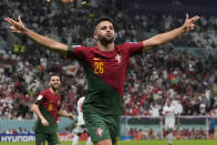 Portugal's Goncalo Ramos celebrates after scoring his side's fifth goal during the World Cup round of 16 soccer match between Portugal and Switzerland, at the Lusail Stadium in Lusail, Qatar, Tuesday, Dec. 6, 2022. (AP Photo/Alessandra Tarantino)