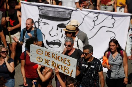 G7 opponents attend a protest in Hendaye