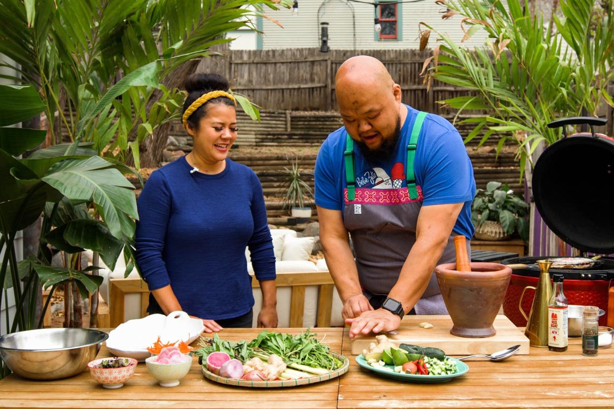 Chefs Christina Nguyen and Yia Vang preparing food