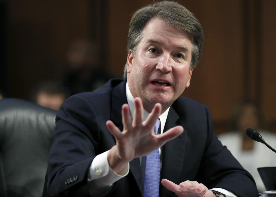 Supreme Court nominee Brett Kavanaugh responds to a question from Sen. Kamala Harris as he testifies before the Senate Judiciary Committee. (Alex Brandon/AP)