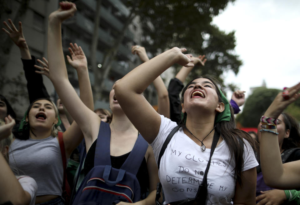 Women demonstrate at the Congress during a march to commemorate the International Women's Day in Buenos Aires, Argentina, Monday, March 9, 2020.(AP Photo/Natacha Pisarenko)