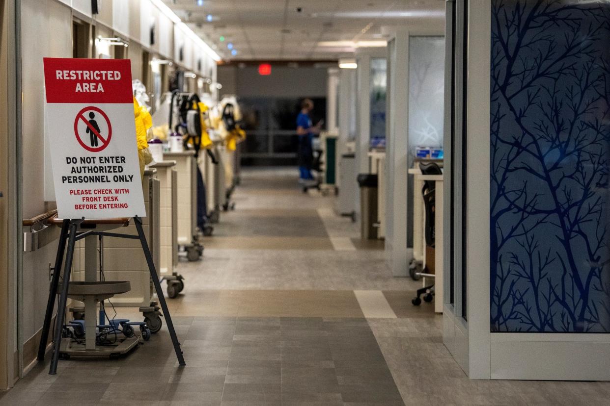 A warning sign marks the entrance to the COVID-19 ward at Mount Carmel Grove City Hospital in December 2020.