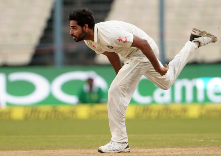 India's Bhuvneshwar Kumar bowls during the second day of the second Test match against New Zealand at Eden Gardens in Kolkata, on October 1, 2016