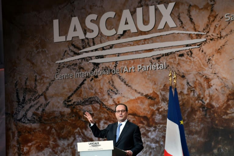 French President Francois Hollande gestures as he delivers a speech during the inauguration of the new museum Lascaux 4 on December 10, 2016, in Montignac