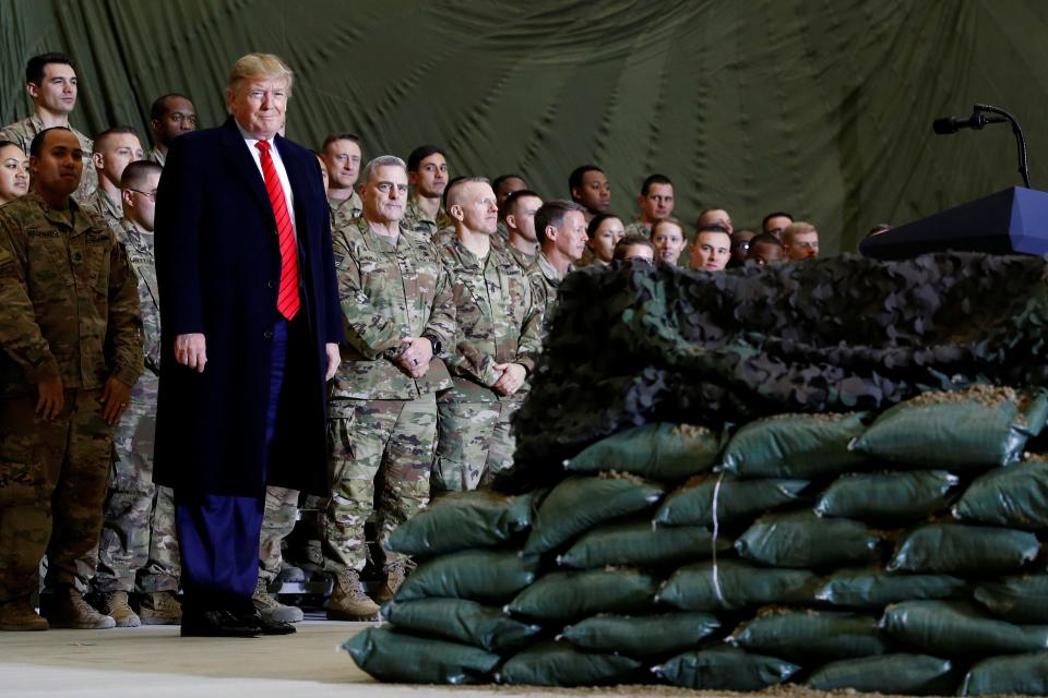 FILE PHOTO: U.S. President Donald Trump delivers remarks to U.S. troops in an unannounced visit to Bagram Air Base, Afghanistan, November 28, 2019. REUTERS/Tom Brenner/File Photo