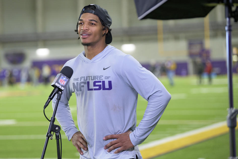 FILE - LSU wide receiver Ja'Marr Chase is interviewed by the NFL Network during an NFL Pro Day at LSU in Baton Rouge, La., in this Wednesday, March 31, 2021, file photo. Chase is expected to be a first round pick in the NFL Draft, April 29-May 1, 2021, in Cleveland. (AP Photo/Matthew Hinton, File)