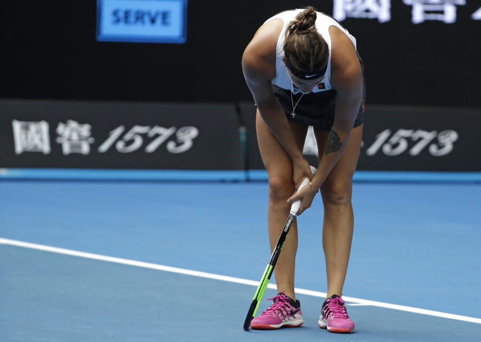 Aryna Sabalenka of Belarus reacts after losing a point to United States' Amanda Anisimova during their third round match at the Australian Open tennis championships in Melbourne, Australia, Friday, Jan. 18, 2019. (AP Photo/Mark Schiefelbein)