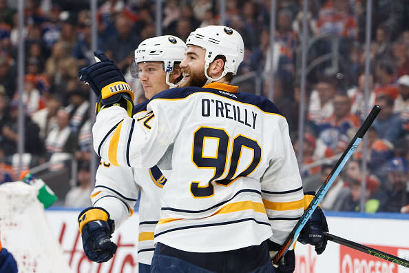 EDMONTON, AB - OCTOBER 16: Sam Reinhart #23 and Ryan O'Reilly #90 of the Buffalo Sabres celebrate a goal against the Edmonton Oilers on October 16, 2016 at Rogers Place in Edmonton, Alberta, Canada. (Photo by Codie McLachlan/Getty Images)