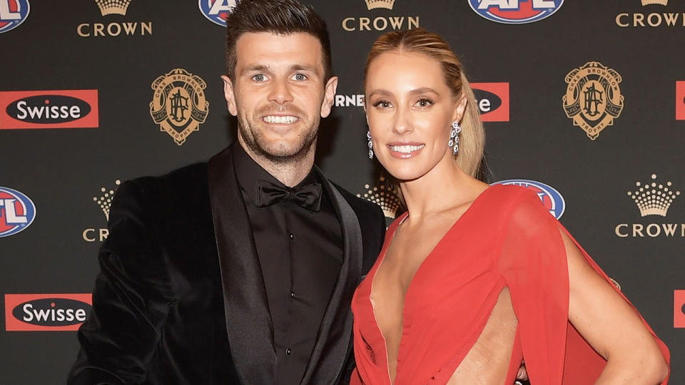 Trent Cotchin of the Tigers and Brooke Cotchin smile for a photo at the 2018 Brownlow Medal.