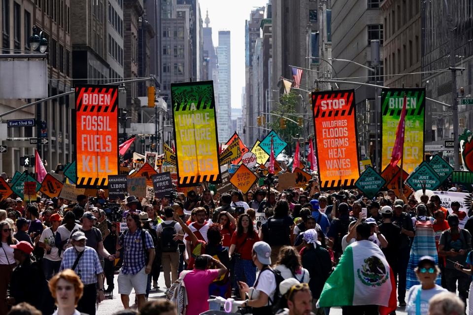 Climate activists march in New York City on Sept. 17, 2023.