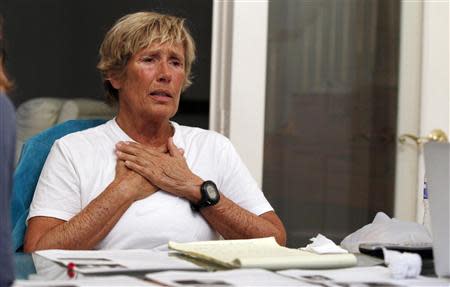 U.S. long-distance swimmer Diana Nyad finishes a conference call with a group of fellow endurance swimmers to answer skeptics about her record-breaking crossing of the Florida Straits last week, in Huntington Beach, California September 10, 2013. REUTERS/Alex Gallardo