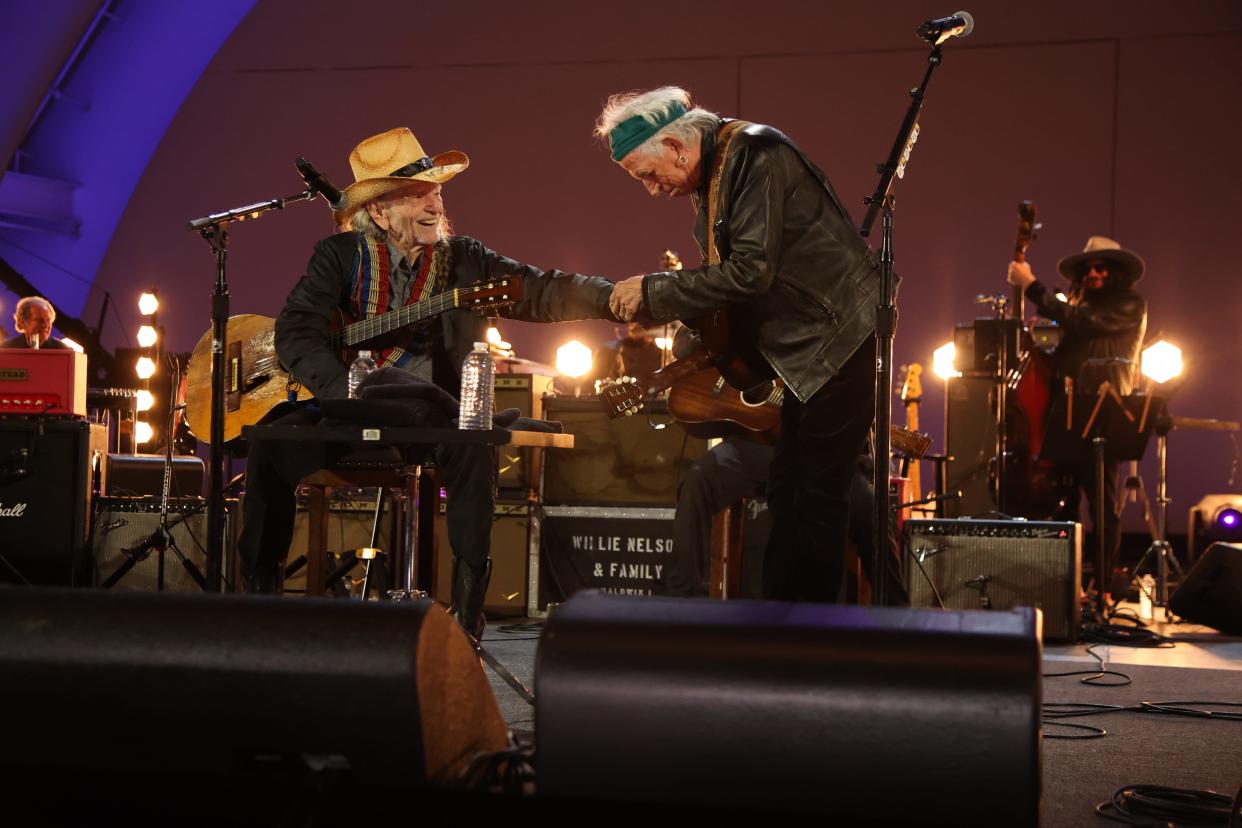 Willie Nelson and Keith Richards at Willie Nelson's 90th birthday celebration concert.