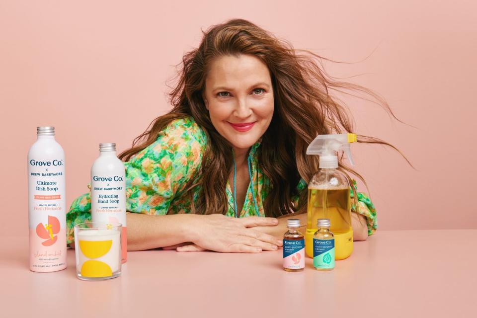 a photo of Drew Barrymore with her Grove Co. collection