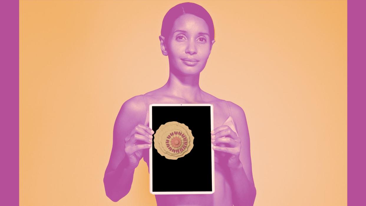 Metastatic Breast Cancer: Everything You Need to Know. , Female holding tablet in front of body to display coloured x-ray illustrations made out of hand made paper structures