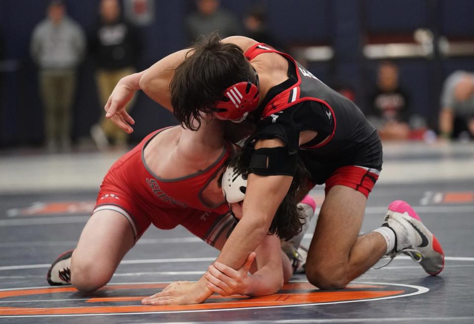 Fox Lane's Justin Gierum defeats Somers' Liam Dwyer in the 126-pound championship match of the Div. 1 wrestling tournament at Horace Greeley High School in Chappaqua on Saturday, February 4, 2023. 