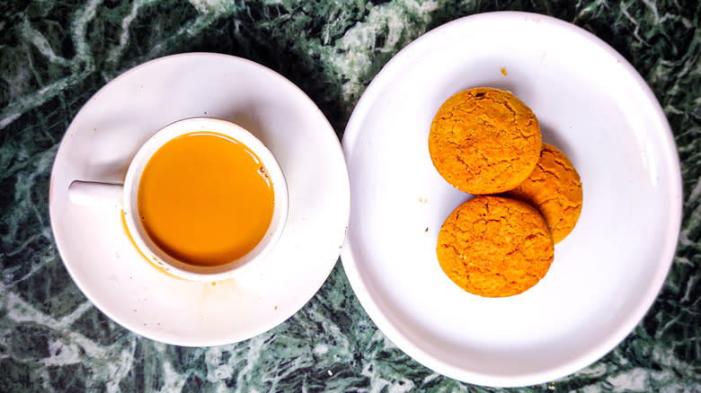 cup of Irani chai and buscuits