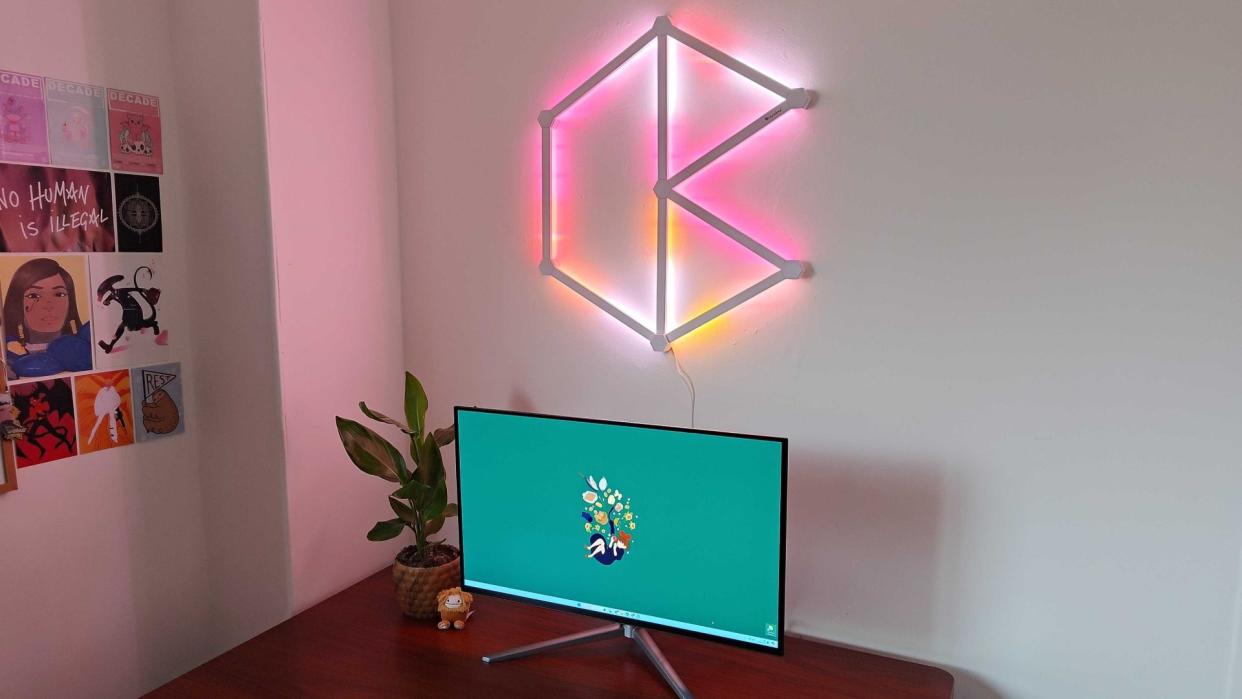  Nanoleaf Lines mounted above gaming desk with monitor on top. 