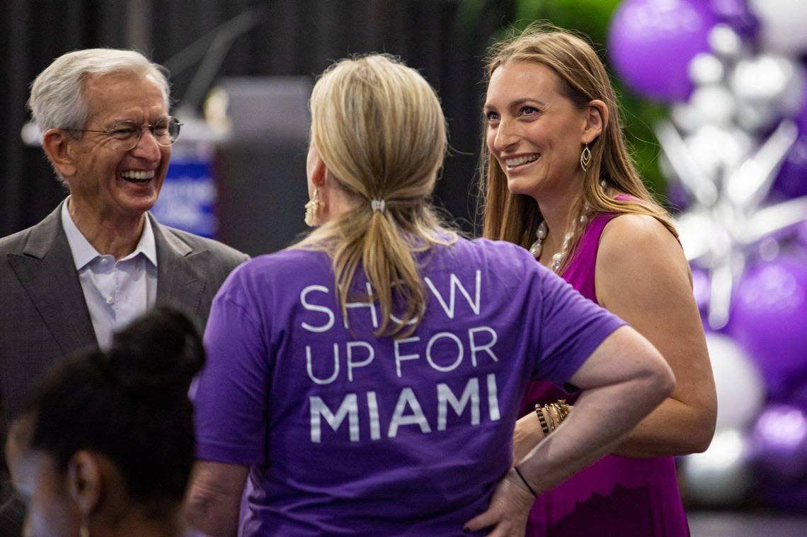 President and CEO of The Miami Foundation Rebecca Fishman Lipsey (right) speaks with people during Give Miami Day at Miami Dade College in Miami, Florida on Thursday, November 17, 2022.