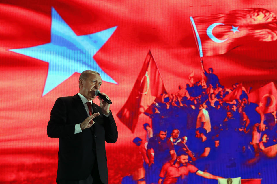 FILE - In this file photo dated Monday, July 15, 2019, Turkey's President Recep Tayyip Erdogan delivers a speech at a rally to honour the victims of the July 15, 2016 failed coup attempt, in Istanbul. “We can be patient up to a point and that patience has a limit,” the charismatic leader Erdogan said Sunday Aug. 4, 2019, arguing Turkey would protect itself from "harassment" by Kurdish YPG militia in Syria. (AP Photo/Lefteris Pitarakis, FILE)