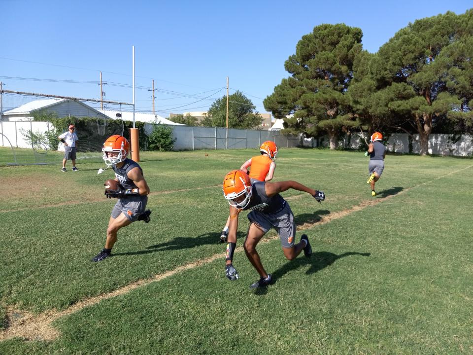 Artesia High School football players participate in the first of two-a-day workouts on July 31, 2023.