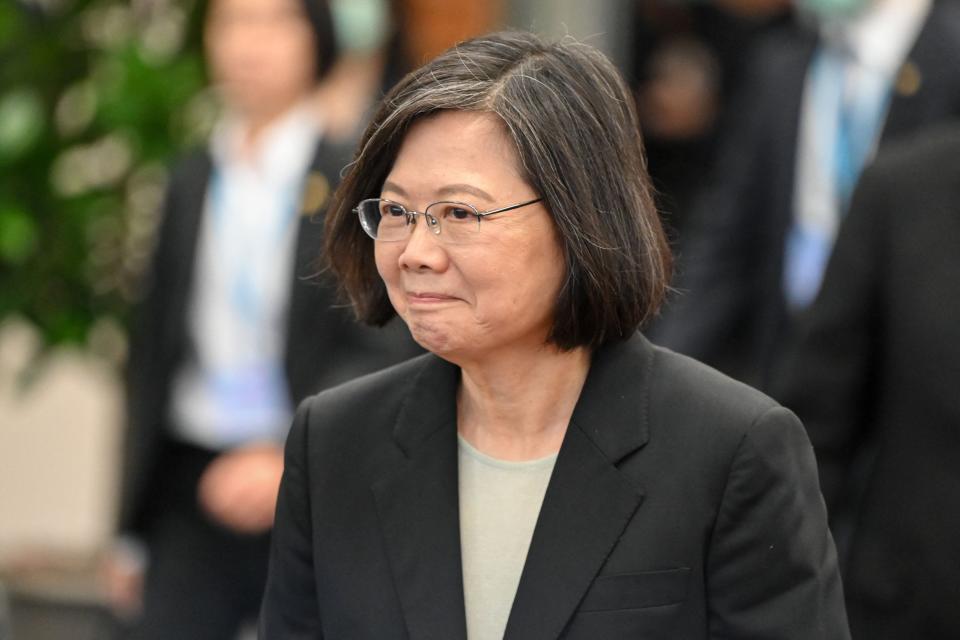 Taiwan President Tsai Ing-wen arrives at the boarding gate of the international airport in Taoyuan on March 29, 2023.