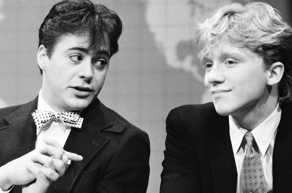 Robert Downey Jr. pointing at Anthony Michael Hall