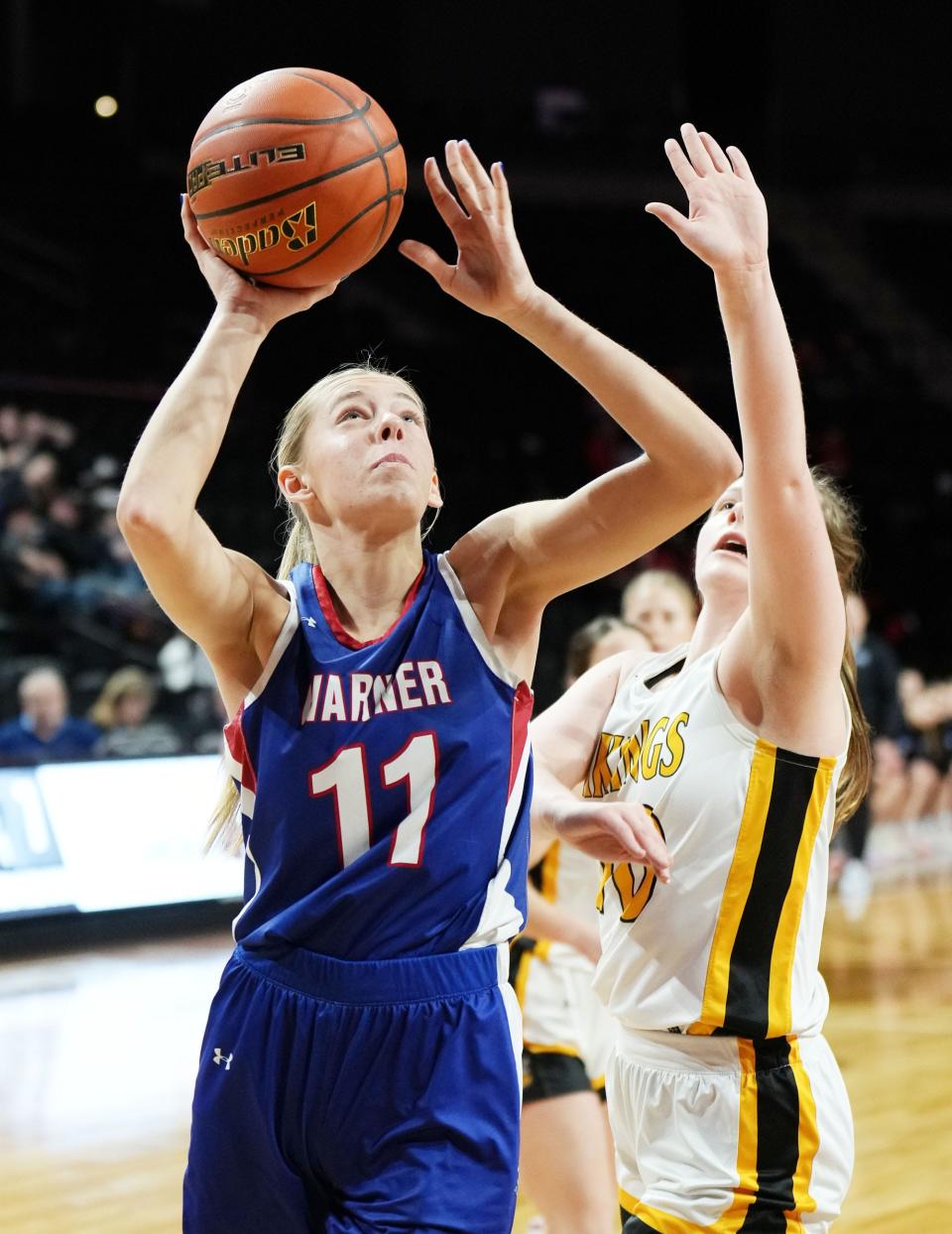 Warner's Kyleigh Schopp looks to score against a James Valley Christian defender during the seventh-place game of the state Class B girls basketball tournament on Saturday, March 9, 2024 in the Summit Arena at The Monument in Rapid City.