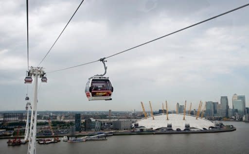 The 'Emirates Air Line' cable car system pictured above the O2 Arena in east London on June 28, 2012. The cable car has been strung over the Thames, an athletes' terminal built at Heathrow Airport, and Olympic traffic lanes set up -- yet Londoners still fear the Games will bring their city to a standstill