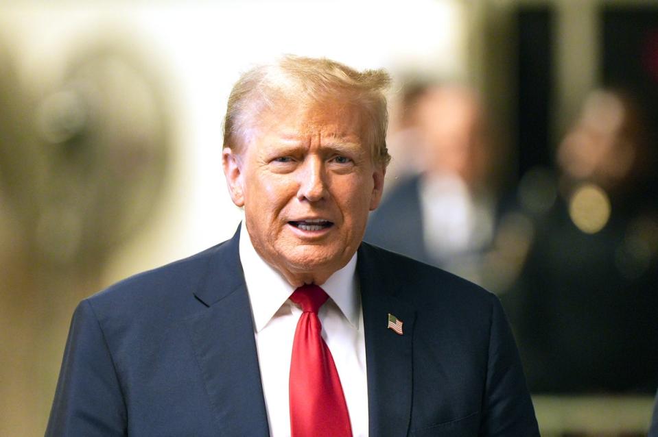 Donald Trump speaks to the media outside the courtroom during his trial (Getty Images)