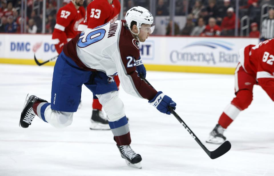 Colorado Avalanche center Nathan MacKinnon (29) scores a goal against the Detroit Red Wings during the second period of an NHL hockey game Saturday, March 18, 2023, in Detroit. (AP Photo/Duane Burleson)