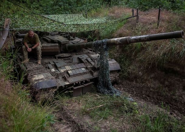 PHOTO: A Ukrainian serviceman sits atop a tank, amid Russia's attack on Ukraine, in Donetsk region, Ukraine, June 12, 2023. (Oleksandr Ratushniak/Reuters)