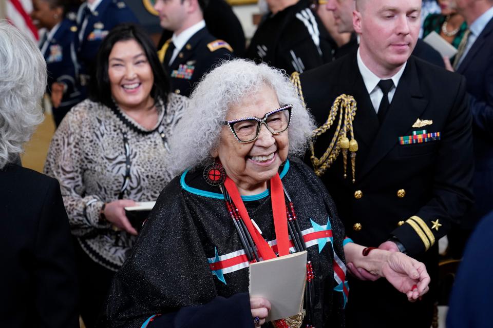 Henrietta Mann leaves March 21 after President Joe Biden presented her the National Humanities Medal at White House in Washington.