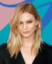 <p>Mid length hair doesn't have to feel dowdy. Go for a messy side part and choppy layers for a more rock and roll feel Karlie Kloss style.</p>