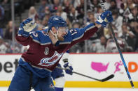 Colorado Avalanche right wing Valeri Nichushkin celebrates his goal against the Tampa Bay Lightning during the second period in Game 2 of the NHL hockey Stanley Cup Final, Saturday, June 18, 2022, in Denver. (AP Photo/John Locher)