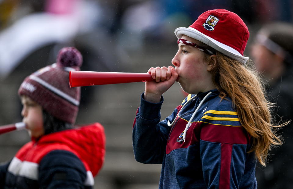 A Galway supporter blows a vuvuzela while supporting her team during the Connacht GAA Football Senior Championship Final match between Sligo and Galway at Hastings Insurance MacHale Park in Castlebar, Mayo. (Photo By Brendan Moran/Sportsfile via Getty Images)