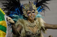 <p>A dancer from the Unidos do Peruche samba school performs during a carnival parade in Sao Paulo, Brazil, Saturday, Feb. 10, 2018. (Photo: Andre Penner/AP) </p>