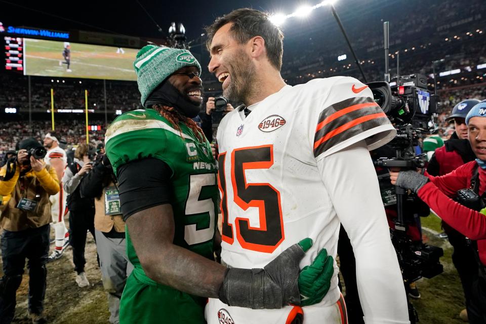Cleveland Browns quarterback Joe Flacco greets New York Jets linebacker C.J. Mosley after a game Dec. 28, 2023, in Cleveland.