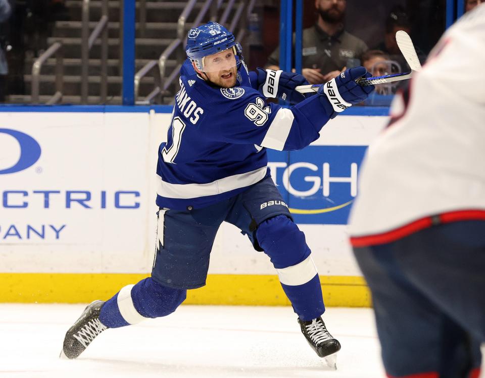 wApr 9, 2024; Tampa, Florida, USA; Tampa Bay Lightning center Steven Stamkos (91) passes the puck against the Columbus Blue Jackets during the third period at Amalie Arena. Mandatory Credit: Kim Klement Neitzel-USA TODAY Sports