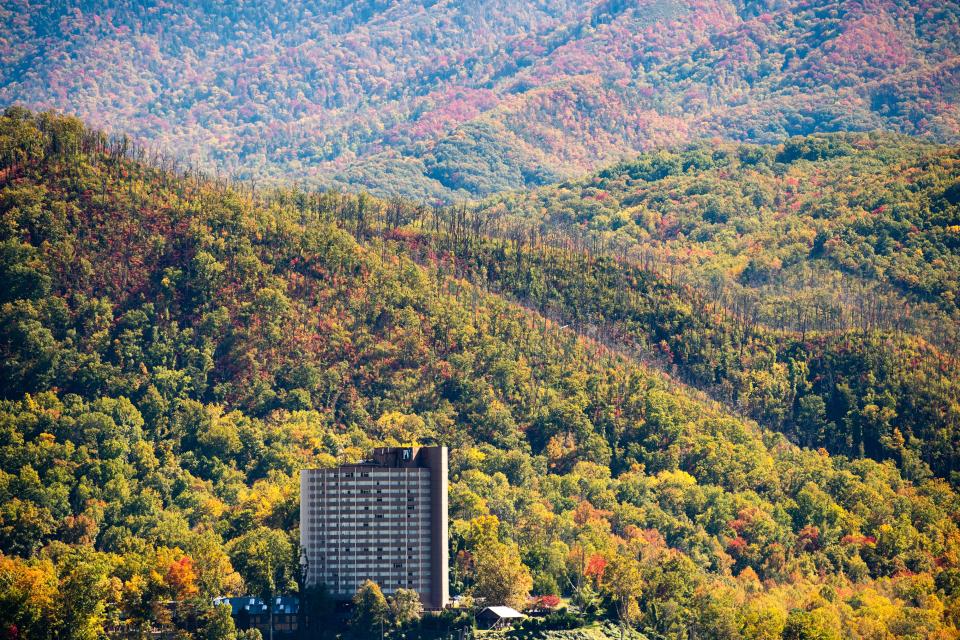 Patches of dead trees marking the fire path from the 2016 fire that swept through the Gatlinburg area can still be seen around the Park Vista hotel from the Gatlinburg Bypass on Wednesday, Oct. 27, 2021.