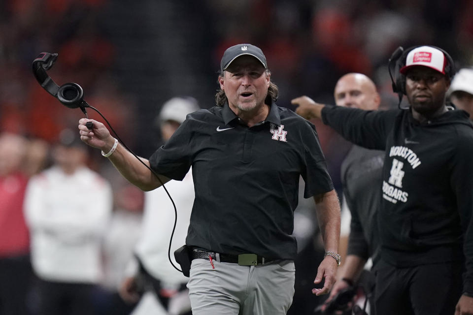 Houston coach Dana Holgorsen reacts to a call during the second half of the team's NCAA college football game against UTSA on Saturday, Sept. 3, 2022, in San Antonio. (AP Photo/Eric Gay)