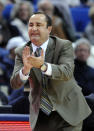 South Florida head coach Jose Fernandez encourages his team during the second half of their 81-53 loss to Connecticut in an NCAA college basketball game in Hartford, Conn., Sunday, Jan. 26, 2014. (AP Photo/Fred Beckham)