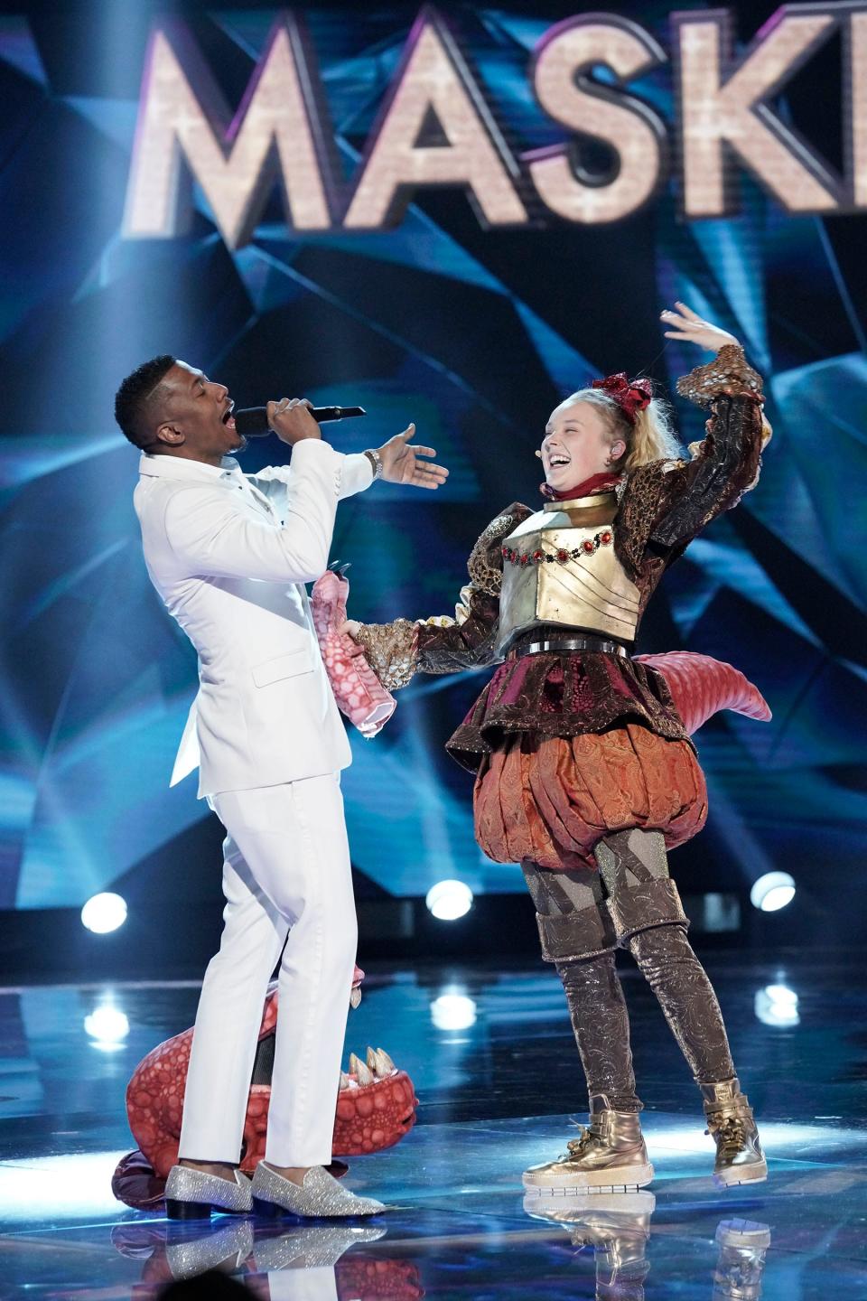 JoJo Siwa was revealed to be the T-Rex on season 3 of "The Masked Singer."