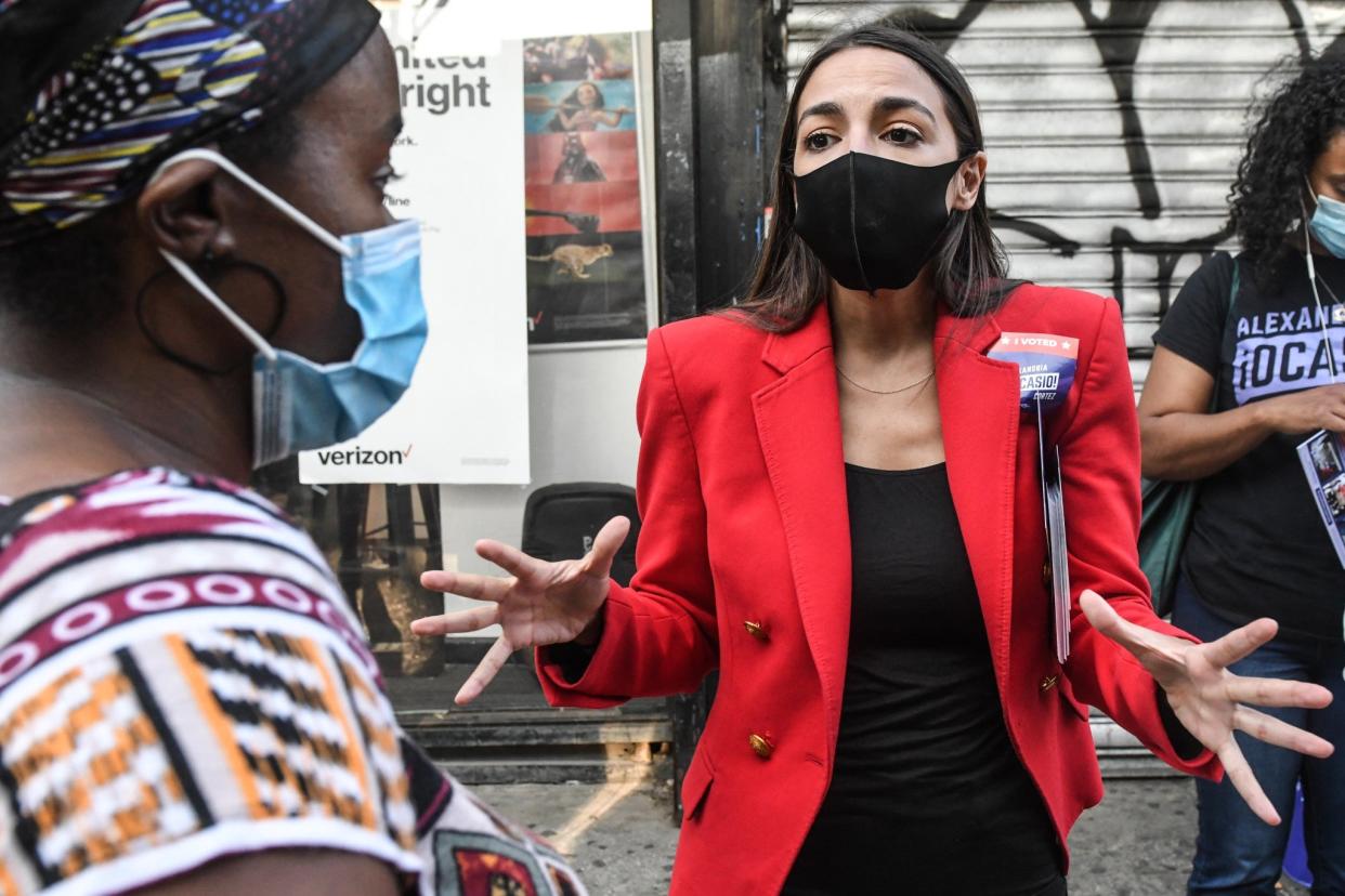 Alexandria Ocasio-Cortez, who is endorsing some of the newcomers, campaigns in the Bronx borough of New York City on Tuesday: Getty