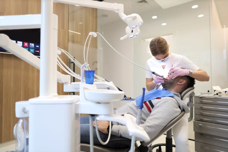 A dentist is seen working at dental clinic EDC in Zagreb