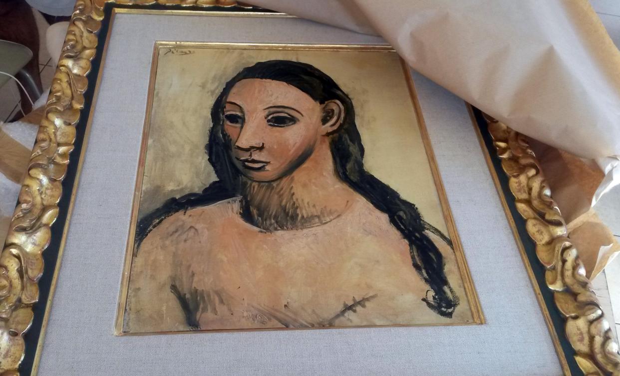 PARIS, FRANCE - JULY 31: A handout picture taken on July 31, 2015 and released on August 3, 2015 by the French Customs office, shows the seized painting 'Head of a young woman' by famous Spanish painter Picasso, at the Customs offices in Calvi. A Picasso worth 25 million euros (£17.5m/US$27.4 million) and considered a cultural treasure by Spanish authorities who had barred it from being exported has been seized from a boat docked at Corsica, according to French authorities on August 4. (Photo by French Customs Office/Anadolu Agency/Getty Images)