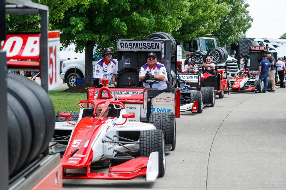 Indy Lights Series vehicles making their way to the track for practice during the Detroit Grand Prix's Free Prix Day in Detroit on Friday, June 3, 2022.