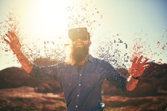 Man with VR headset standing outside