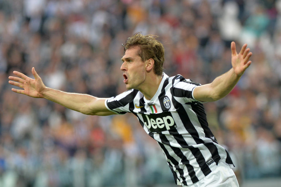 Juventus forward Fernando Llorente, of Spain, celebrates after scoring during a Serie A soccer match between Juventus and Livorno at the Juventus stadium, in Turin, Italy, Monday, April 7, 2014. (AP Photo/Massimo Pinca)