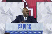 RETRANSMISSION TO CORRECT ID TO JAMAHL MOSLEY - Orlando Magic head coach Jamahl Mosley smiles after NBA Deputy Commissioner Mark Tatum announced that the Magic have won the first pick in the 2022 NBA draft during the NBA basketball draft lottery Tuesday, May 17, 2022, in Chicago. (AP Photo/Charles Rex Arbogast)