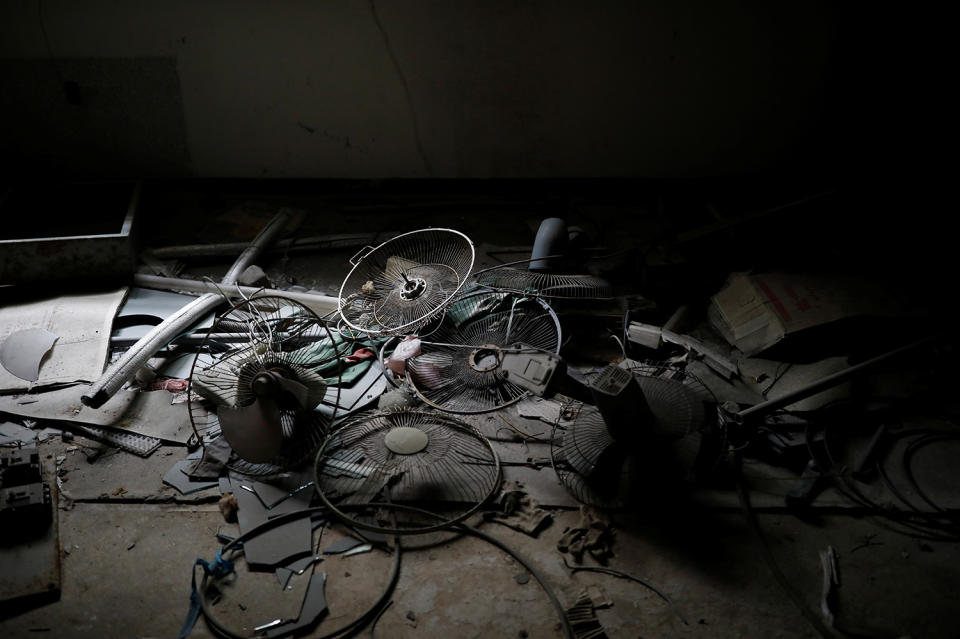 <p>Broken fans lie on the ground at the abandoned Alps Ski Resort located near the demilitarized zone separating the two Koreas in Goseong, South Korea, Jan. 17, 2018. (Photo: Kim Hong-Ji/Reuters) </p>